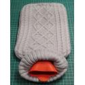 Hot water bottle, in a gray jumper